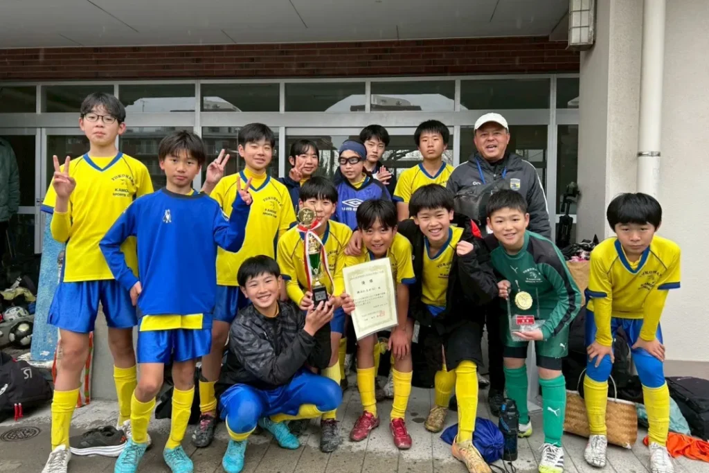 石原コーチと選手たち