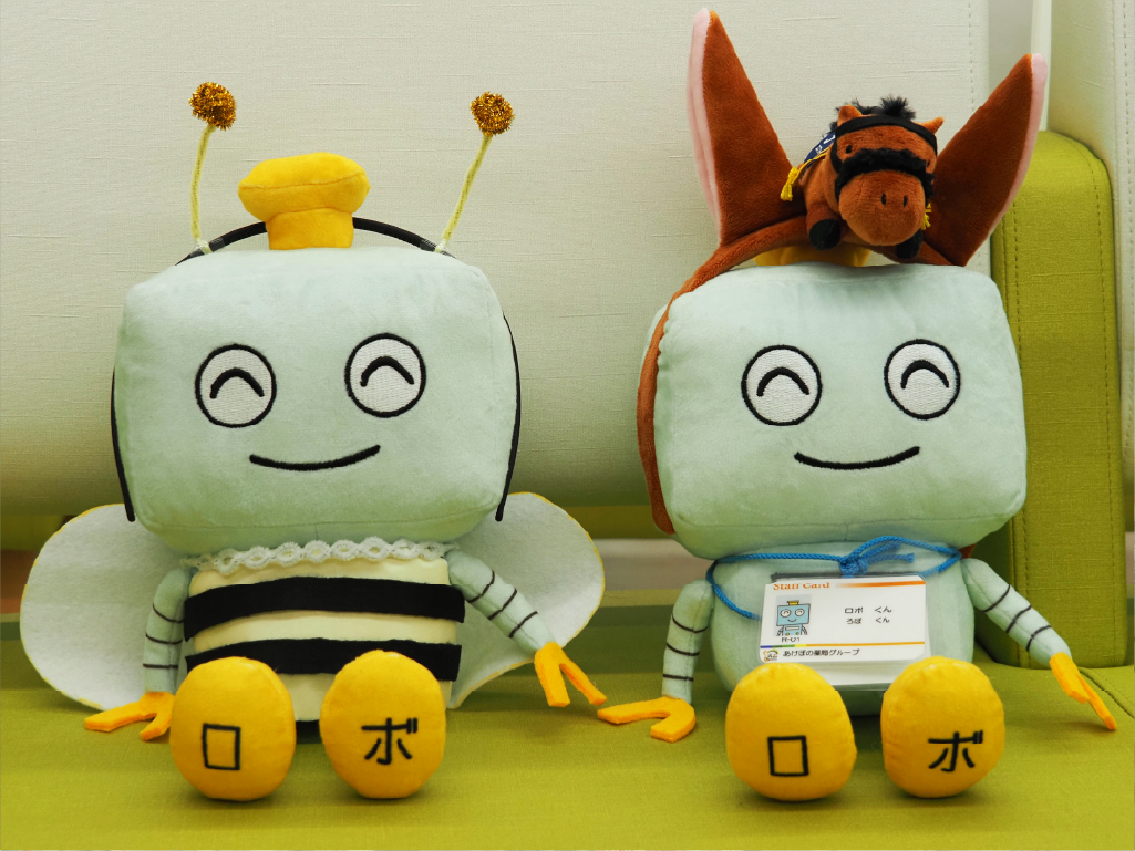 あけぼの薬局（株式会社アイリスファーマ）のキャラクターロボくん